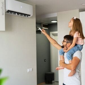Family using split AC in the modern home.