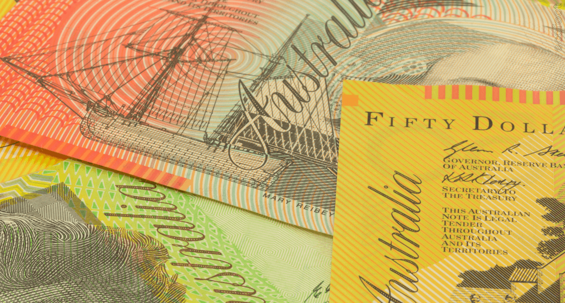 Australian currency notes representing Victorian Energy Upgrades rebates and government incentives for heating and cooling systems.