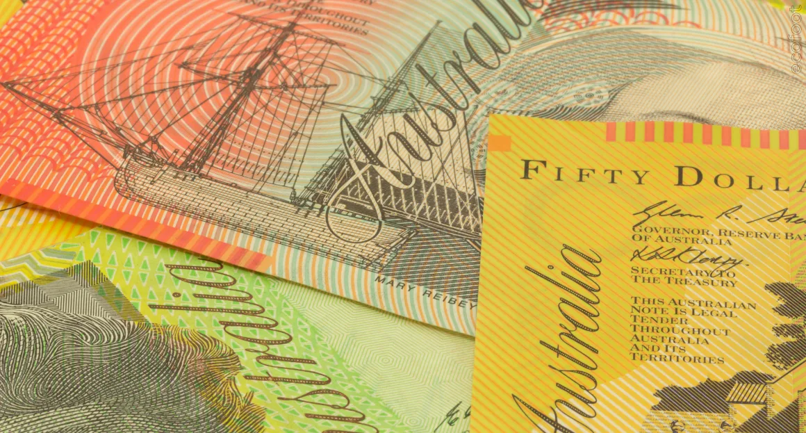 Australian currency notes representing Victorian Energy Upgrades rebates and government incentives for heating and cooling systems.