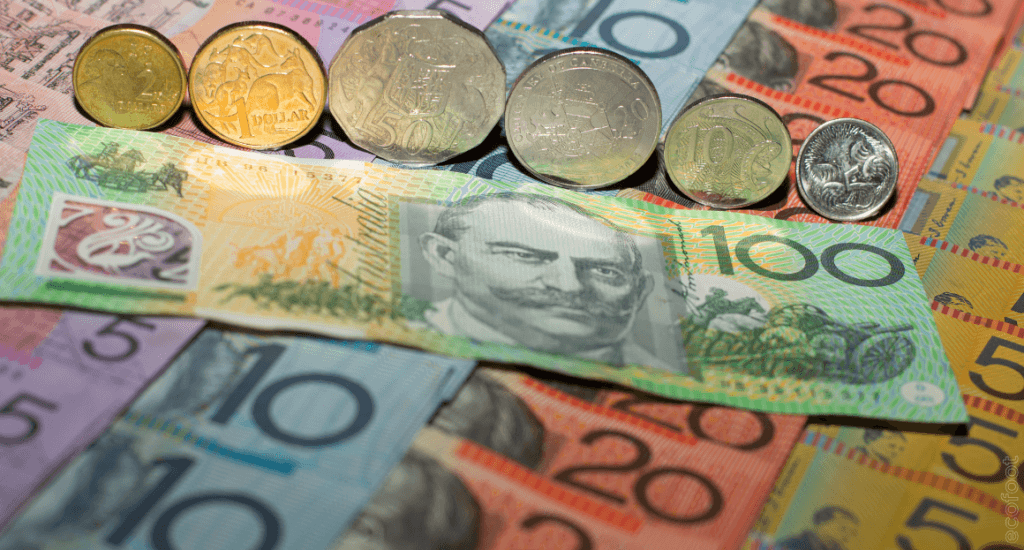 Australian dollar notes and coins arranged together, representing cost savings and financial benefits from energy-efficient LED lighting upgrades.